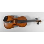 Violine 20. Jh., Fichte und Ahorn, reparaturbedürftig, L Korpus 36 cm.