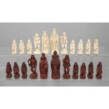 Konvolut Schachfigurenum 1930, zweiundzwanzig Stück, Elfenbein beschnitzt, teils farbig gefasst,