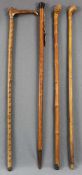 Vier Gehstöcke / Spazierstöcke, Holz, einer mit Horn. Bis 91 cm lang. Four walking sticks wood.