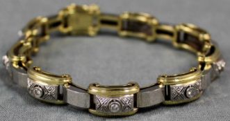 Armband mit 9 Diamanten im Brillantschliff Gelb und Weißgold 585. 34 Gramm gesamt. 20 cm lang.