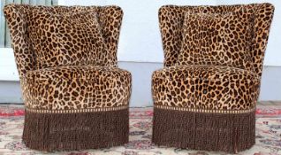 Ein Paar Sessel, Leopardenlook. 1950 er / 60 er. 80 cm hoch. U.a. Gebrauchsspuren. A pair of