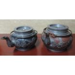 Zwei Teekannen. Steinzeug mit Zinnverzierung. Griffe Bronze. Wohl China 19. Jahrhundert. Bis 19