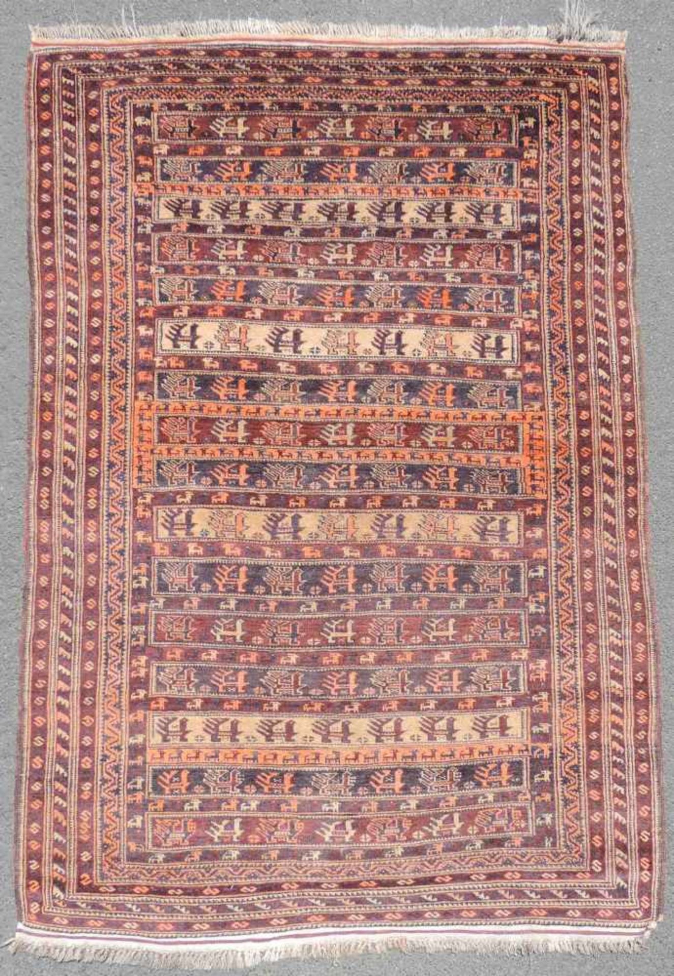 Belutsch Orientteppich. Afghanistan. Alt, um 1930. 188 cm x 122 cm. Handgeknüpft. Wolle auf Wolle.