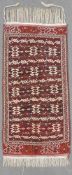 Jomud Stammesteppich. Turkmenistan. Antik. Um 1900. 247 cm x 135 cm. Handgeknüpft. Wolle auf