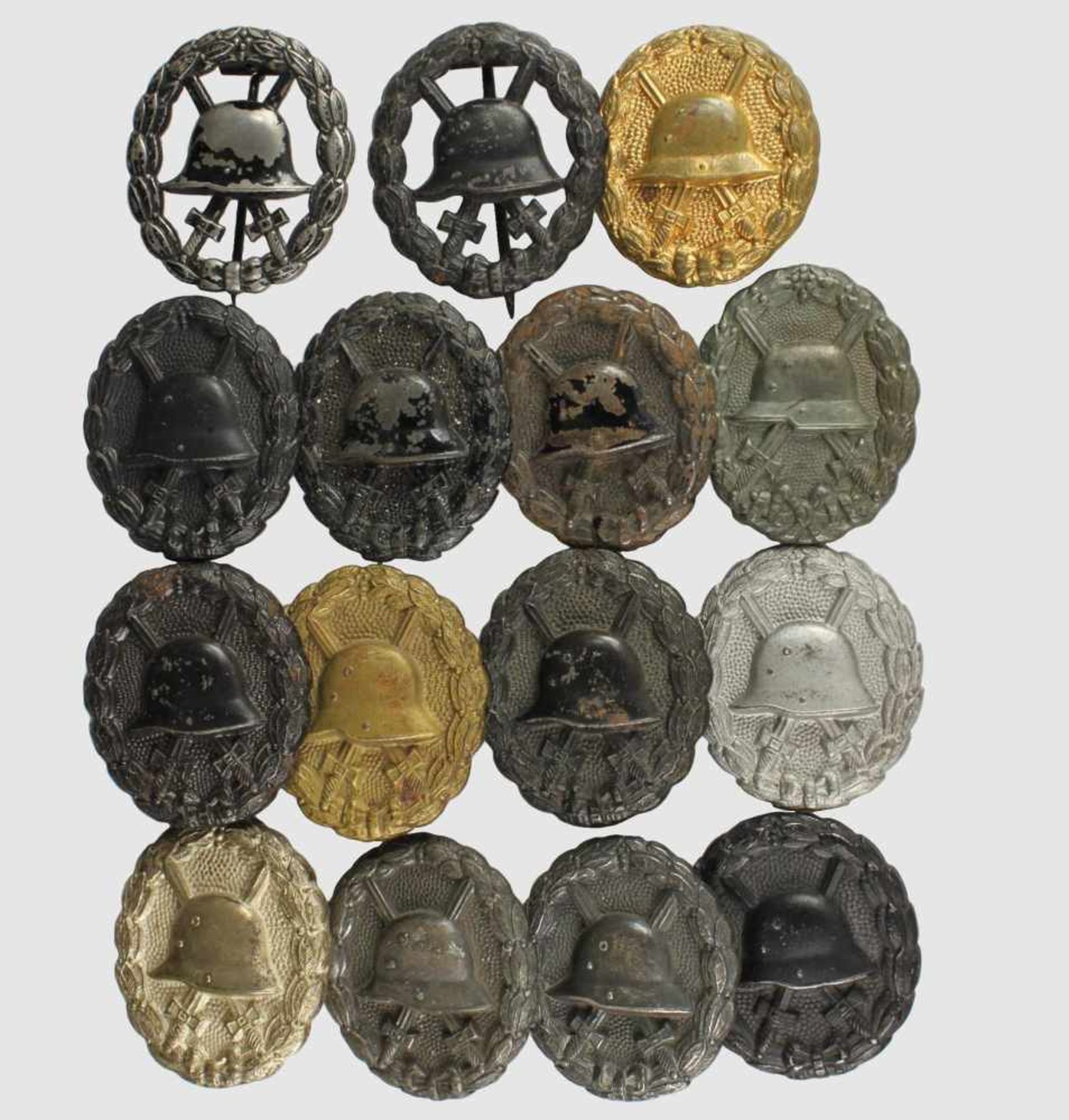 Konvolut von 15 Verwundetenabzeichen des 1. Weltkrieg in Gold (2), Silber (2) und Schwarz (11),
