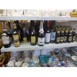 Bottles of: Kummel, Tokhaiaszu, Silio (Real Vinicola) from Portugal, Stone's Ginger Wine, Tom