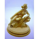 An 18th century carved ivory nude female with a lion ONLINE BIDDING IS ONLY THROUGH UKAUCTIONEERS.