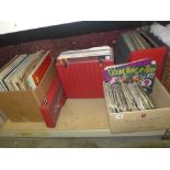 A collection of LP records, mainly musicals and classical, in a box and two record cases, and a