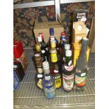 18 various bottles of liqueurs and aperitifs including Galliano, Supreme Denoix, Bo Coco Blue