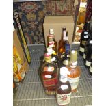 Nine bottles of spirits, comprising Ballantyne's Scotch whisky and Johnnie Walker Red Label Scotch