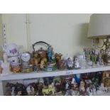 A Doulton figurine 'Fat Boy', a collection of figurines, animal ornaments and bells, a copper