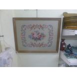 A framed silk Oriental panel, a framed tapestry depicting an 18th Century couple and framed