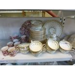 A Mintons 12 piece part tea service including cake plate, cream jug and sugar bowl, pattern G6568,