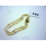 A 9 ct gold and cultured pearl two-row bracelet and clasp ONLINE BIDDING IS ONLY THROUGH