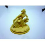 A miniature 18th century European carved ivory figure of a naked lady riding a lion, height 7 cm