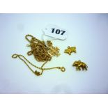 A small collection of 9 ct gold chains and charms, estimated weight 12.7 gm ONLINE BIDDING IS ONLY