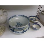 A first period Worcester blue-printed punch bowl decorated with rose sprays, 8 in diameter, a