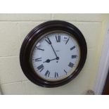 A wall clock with painted 13-inch dial in mahogany surround [wall by office] ONLINE BIDDING IS