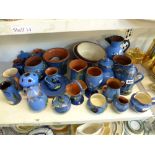 A collection of approximately 33 early 20th century Devon ware 'Kingfisher' pattern pottery pieces