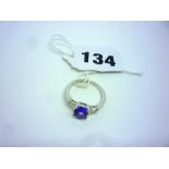 A white metal, tanzanite and diamond three-stone ring, tests as 14 ct gold ONLINE BIDDING IS ONLY