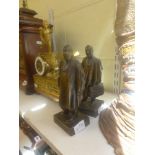 Two small French statues marked Armanet