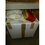 Four boxes of assorted blankets, vintage print curtains, table linen, packaged bed linen, etc. [