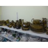 An extensive collection over two shelves of Ridgways Robert Burns commemorative china including