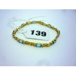 A 14ct gold, blue topaz and diamond bracelet ONLINE BIDDING IS ONLY THROUGH UKAUCTIONEERS.COM