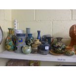 A collection of art pottery and other vases and pots including Doulton Lambeth faience, Bretby,