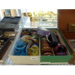 Two shoe boxes of decorative bangles ONLINE BIDDING IS ONLY THROUGH UKAUCTIONEERS.COM