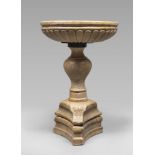 A RARE LARGE YELLOW MARBLE STOUP, 17TH CENTURY basin with molded border. Leg baluster. triangular