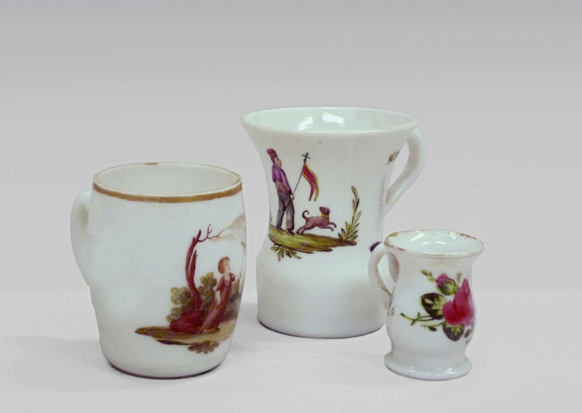 THREE OPALINE GLASSES, EARLY 20TH CENTURY of milk white ground, painted with figures and landscapes.