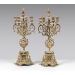 A PAIR OF GILDED BRONZE CHANDELIERS, PERIOD NAPOLEON III five arms with ramages and chiselled