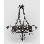 CHANDELIER IN WROUGHT IRON, BEGINNING 20TH CENTURY of Renaissance style with pierced crown. Measures