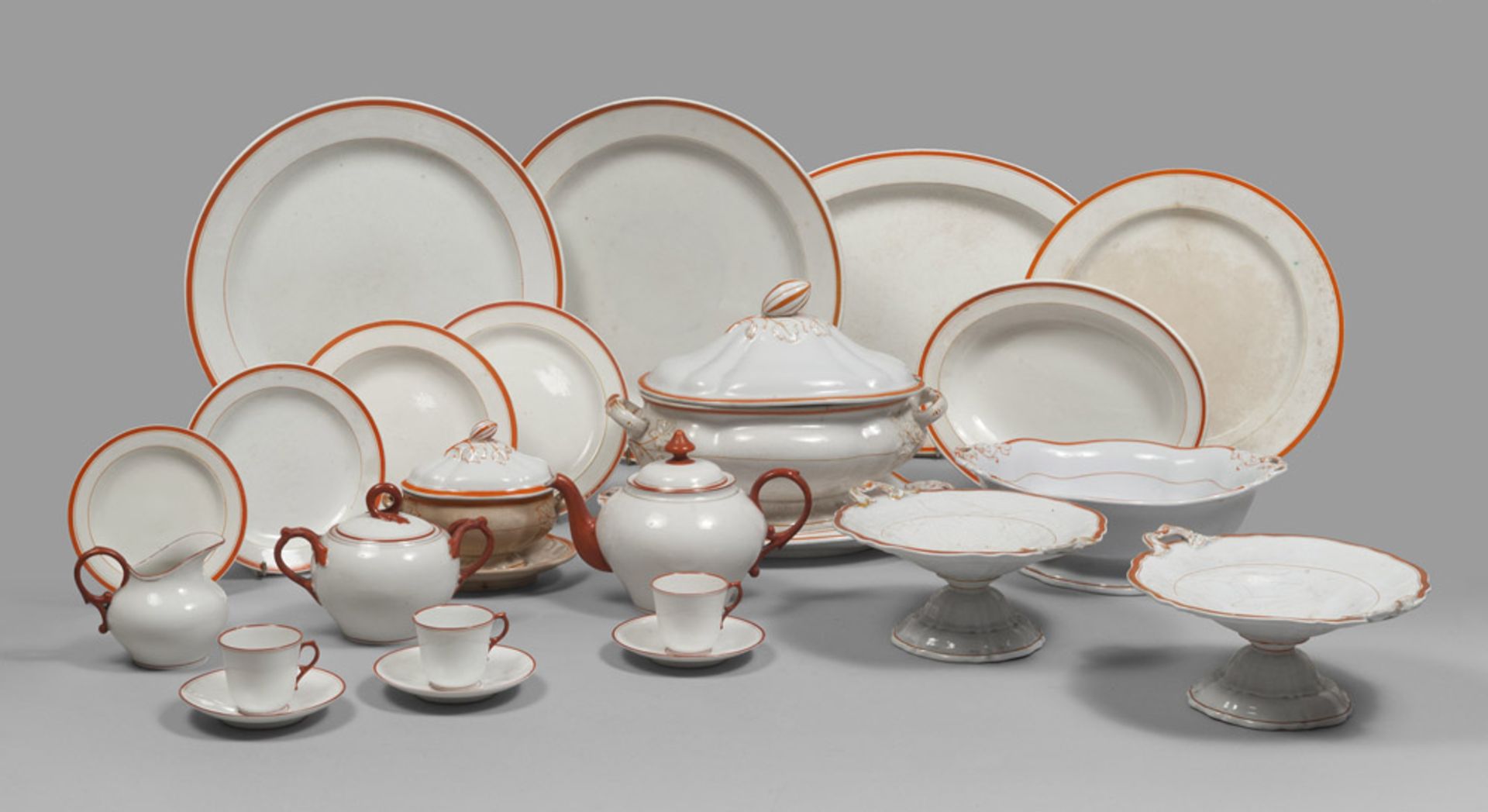 SET OF CERAMICS DISHES, PROBABLY SICILY, LATE 19TH CENTURY of white enamel with orange edges and