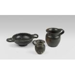 TWO BLACK-GAZE LADLES AND A KYLIX, 4TH-3TH CENTURY B.C. Measures cm. 6 x 4,6, cm. 8,5 x 10 e cm. 4,5