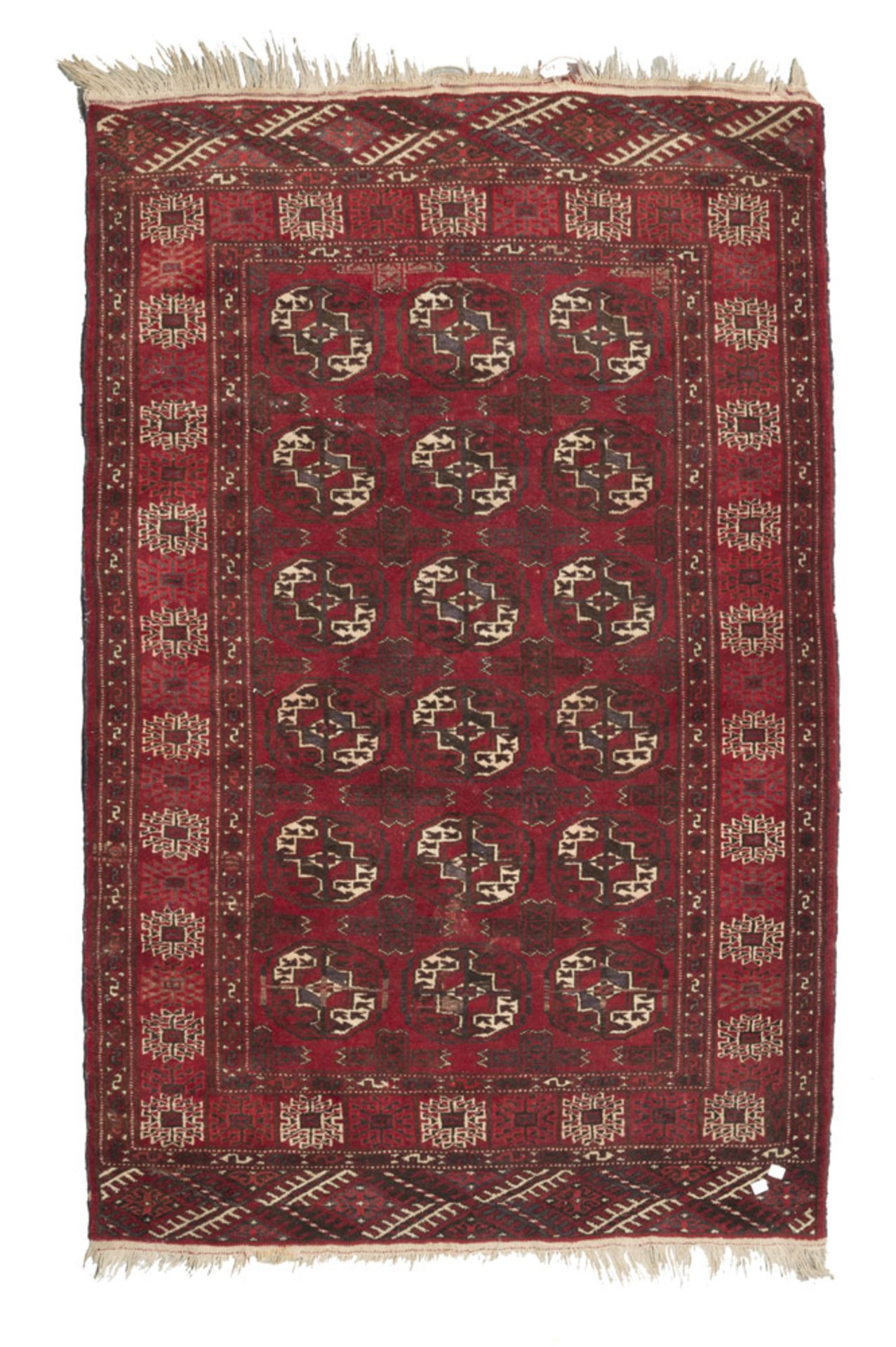 PAKISTAN CARPET, EARLY 20TH CENTURY bokara design, in the field with red ground. Measures cm. 170