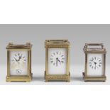 THREE CAPPUCCINES IN BRASS, 20TH CENTURY with box with grinded glasses, clockwork to sight and