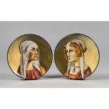 A PAIR OF MAJOLICA PLATES, FAENZA 20TH CENTURY decorated in polychrome female busts, works by