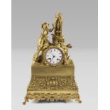 PARISIAN CLOCK IN ORMOLU, 19TH CENTURY with figure of page with newspaper kiosk on the hat. Quadrant