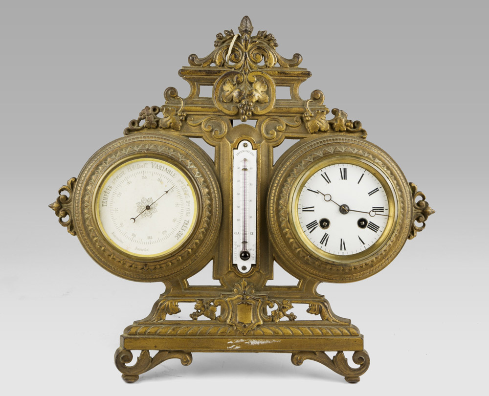 CLOCK TABLE BAROMETER, BEGINNING 20TH CENTURY with support of bronze. Measures cm. 36 x 38 x 15.