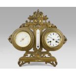 CLOCK TABLE BAROMETER, BEGINNING 20TH CENTURY with support of bronze. Measures cm. 36 x 38 x 15.