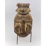 PRE-COLUMBIAN ANTHROPOMORPHOUS VASE, 20TH CENTURY in beige clay, light brown and brown varnish.