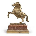 FRENCH SCULPTOR, EARLY 19TH CENTURY. Rampant horse. Gilded bronze Sculpture, cm. 36 x 12 x 34.