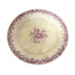 PORCELAIN DISH, EARLY 19TH CENTURY of white and lilac enamal with plant decorum. Diameter cm. 22..