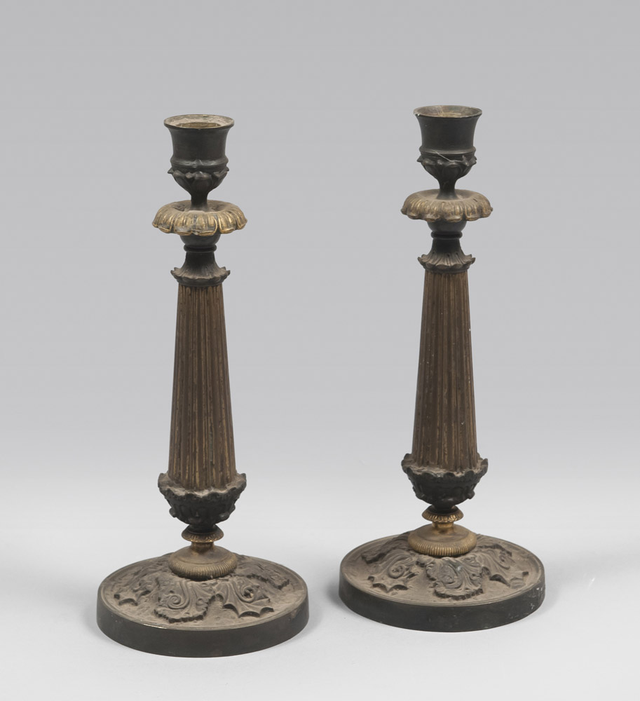 A PAIR OF METAL AND BRONZE CANDLESTICKS, EMPIRE PERIOD with gilt and burnished patina, with stem.