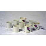 EIGHT PORCELAIN CUPS, GINORI 19TH CENTURY in white enamel and flowers. Of different outlines. Marked