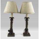 A PAIR OF SMALL MARBLE LAMPS, 20TH CENTURY with stem in lumachino and base in red marble. Complete