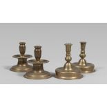TWO PAIRS OF GILDED METAL CANDLESTICKS, 19TH CENTURY with snorkels and rounded bases and threaded.