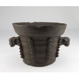 GREAT MORTAR IN BRONZE, 17TH CENTURY with handles as zoomorphic heads and body with indentations.